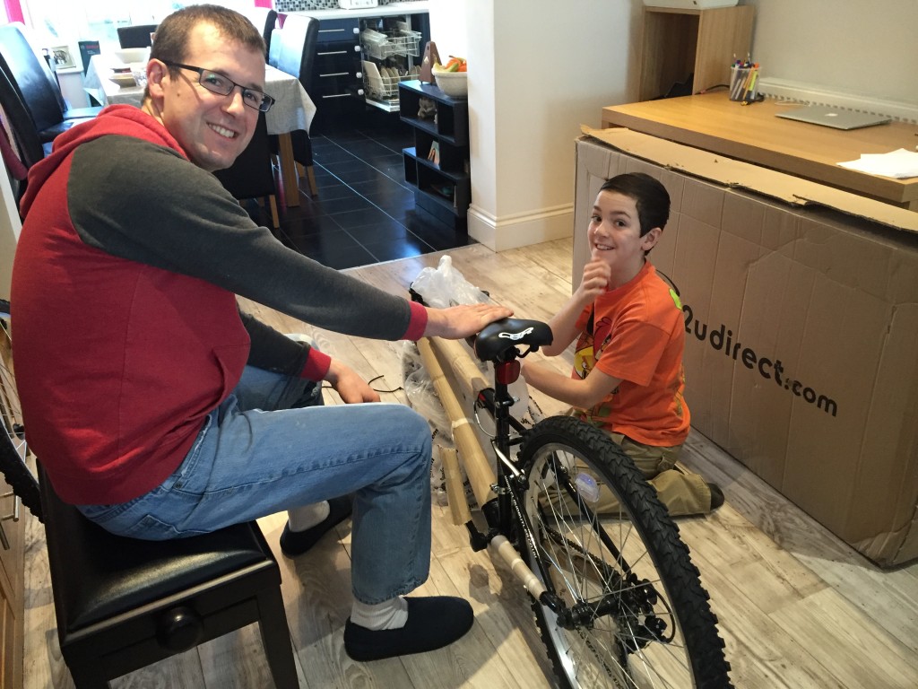 Grant and I assembling his 11th birthday present - a new bike!